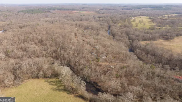 a view of a back yard of a house