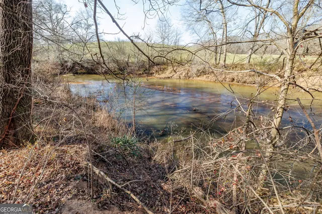 a view of a backyard of the house