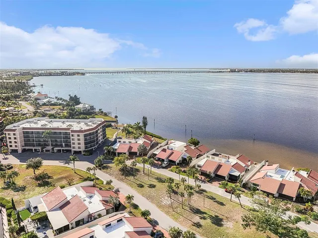 a view of a terrace with a lake view