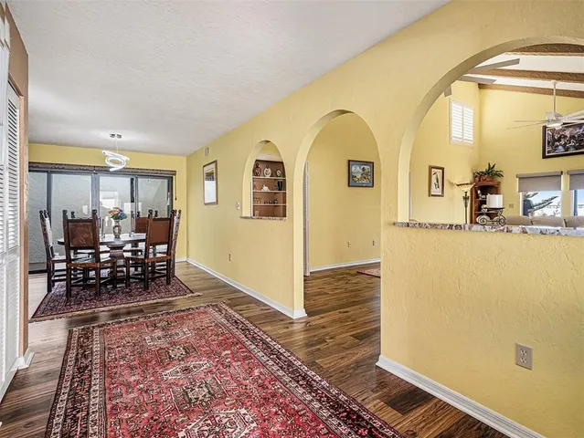 a view of living room and dining room