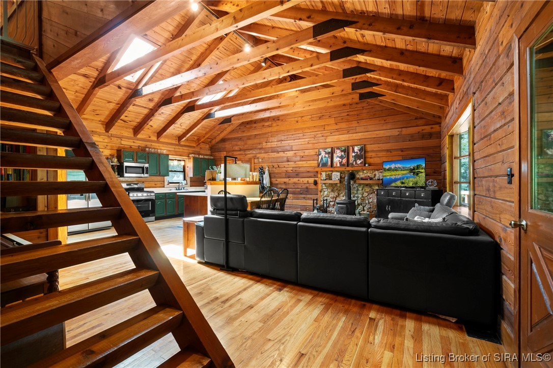 3895 Utz Road Northeast Georgetown, IN 47122 - Photo 17 of 70 View from staircase of the living area and kitchen with wood-burning stove.