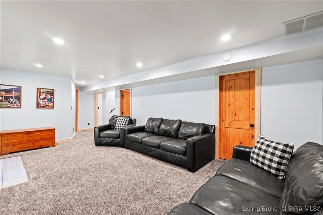 3895 Utz Road Northeast Georgetown, IN 47122 - Photo 31 of 70 Family Room View – Ample seating space with recessed lighting, perfect for gatherings or a home theater.