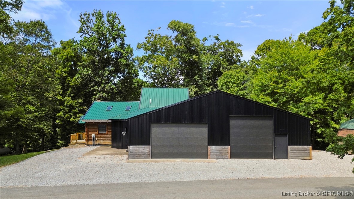3895 Utz Road Northeast Georgetown, IN 47122 - Photo 41 of 70 Garage/Workshop Front View – Large-scale building ideal for storage, vehicles, or hobby space.