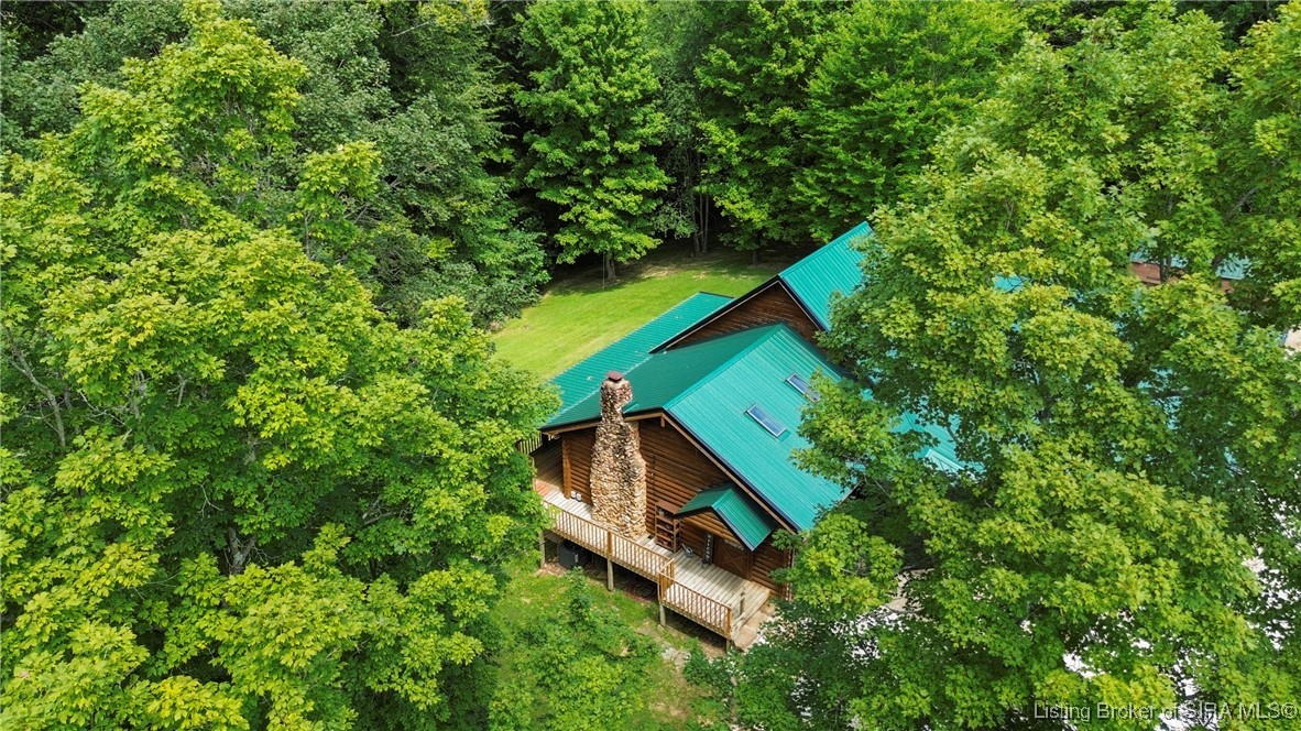 3895 Utz Road Northeast Georgetown, IN 47122 - Photo 44 of 70 Closer Exterior View – Emphasizes charming front porch and natural wood construction.