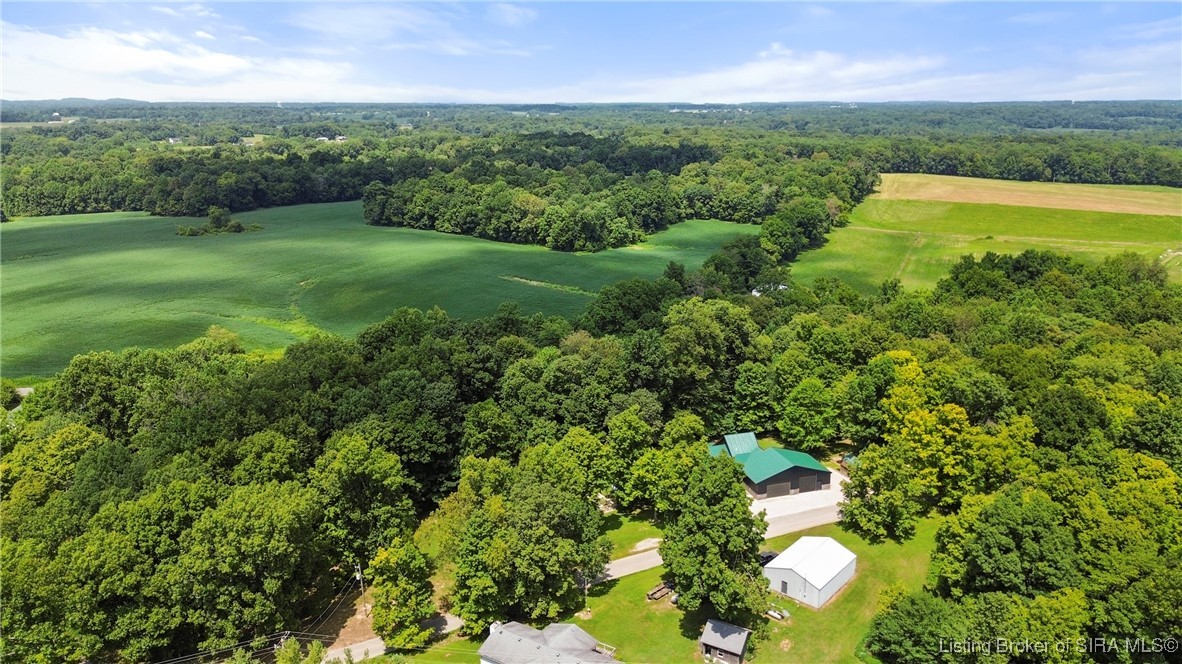 3895 Utz Road Northeast Georgetown, IN 47122 - Photo 47 of 70 Aerial View with Fields and Forest – Showcases the mix of open acreage and mature tree coverage surrounding the home.