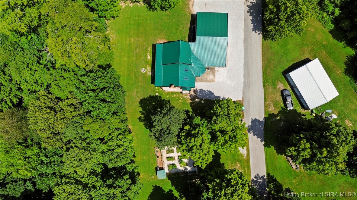 3895 Utz Road Northeast Georgetown, IN 47122 - Photo 50 of 70 Direct Overhead of Home and Garden – Highlights the green metal roof, detached garage, and organized raised garden beds.