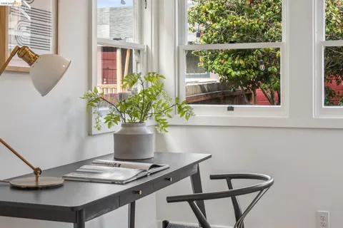a bathroom with a sink and a window
