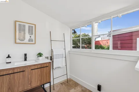 a view of entryway with a window and wooden floor