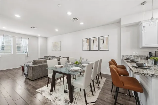 a view of a dining room with furniture