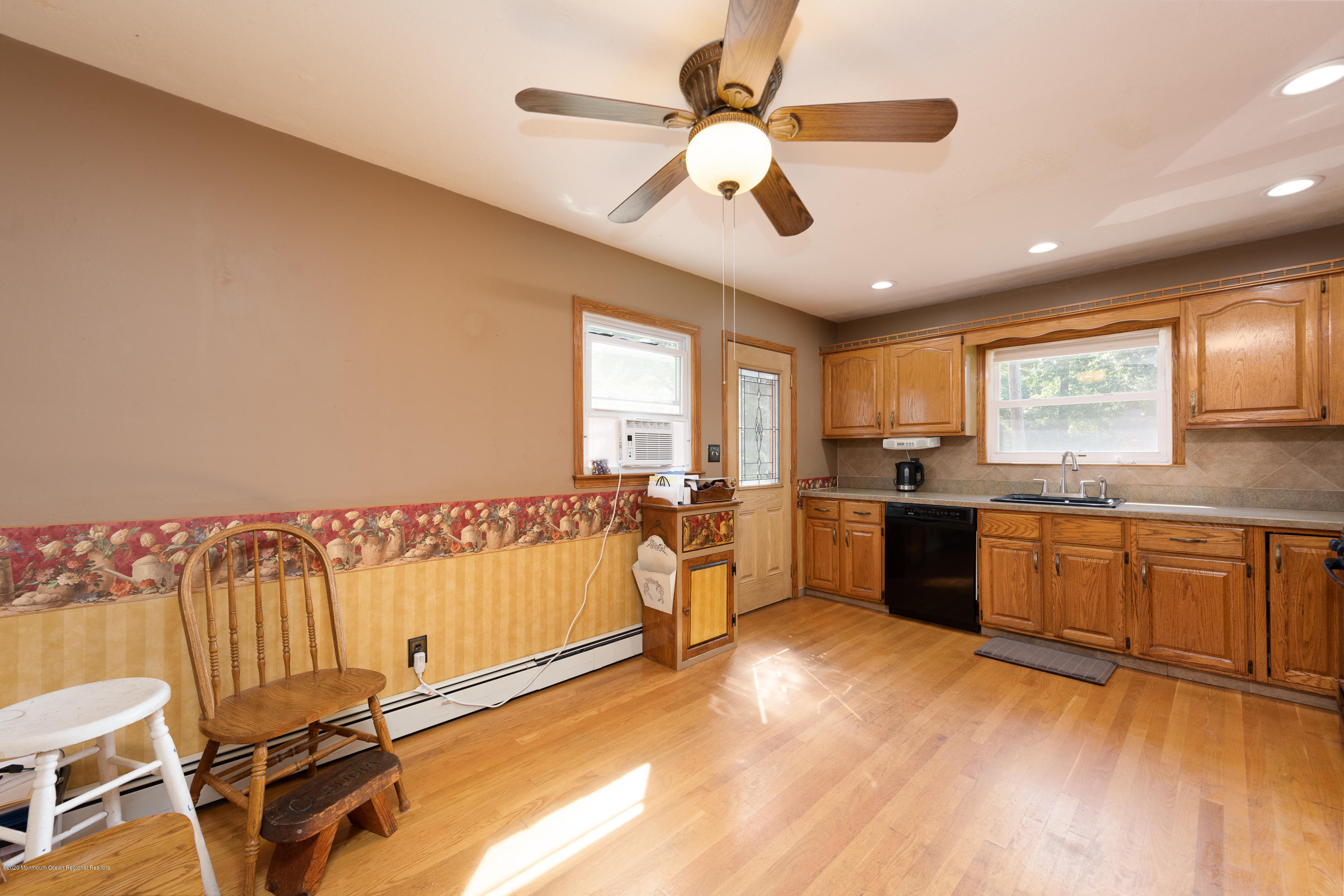 573 Holmdel Road Hazlet, NJ 07730 - Photo 3 of 34 a large white kitchen with a large window