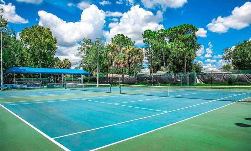 8038 Southwest 108th Loop Ocala, FL 34481 - Photo 41 of 48 a view of a tennis ground