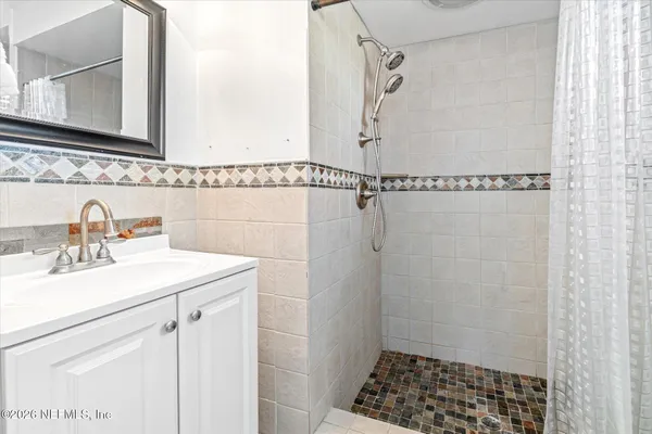 a bedroom with a bed and a closet