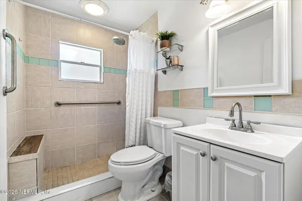 a view of an entryway with white walls