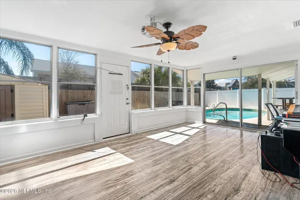 a view of a living room and hardwood floor