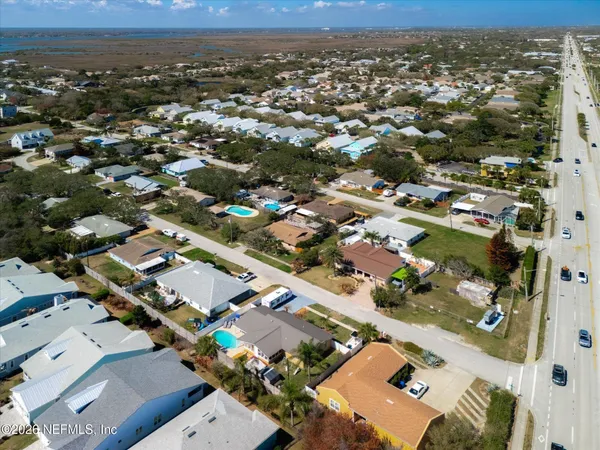 an aerial view of residential house with parking space