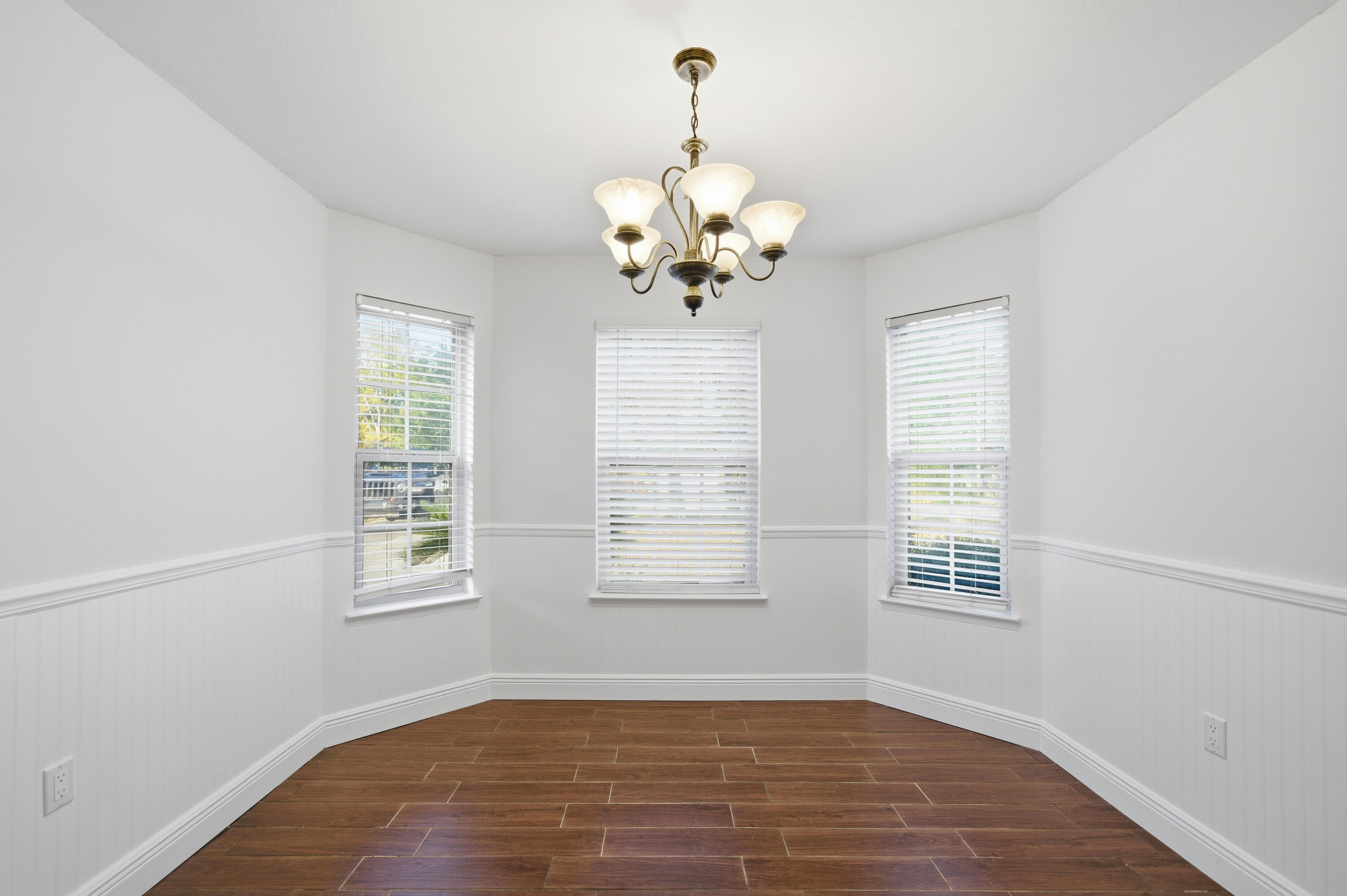 411 Ashley Drive Crestview, FL 32536 - Photo 15 of 44 a view of an empty room with a window