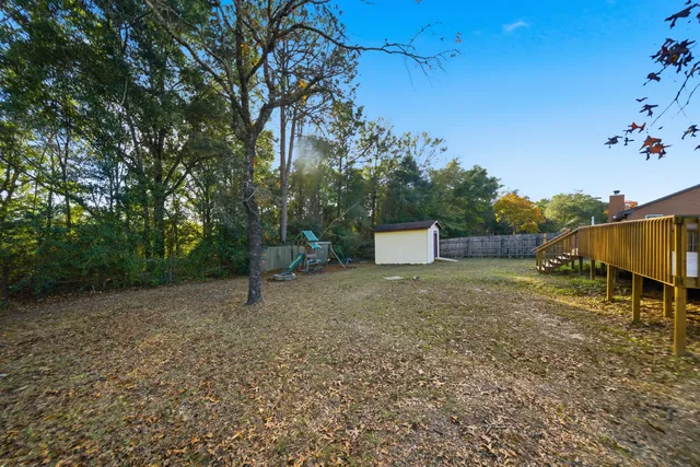 a house view with a backyard space