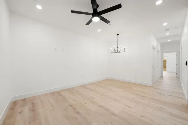 a view of a kitchen with a sink and cabinet