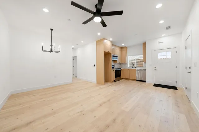 a view of storage and utility room with closet
