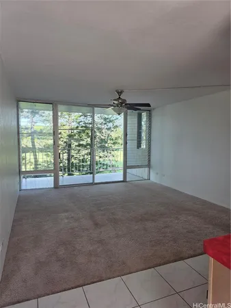 a furnished livingroom with a outdoor space