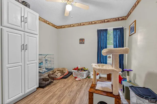 a room with furniture and wooden floor