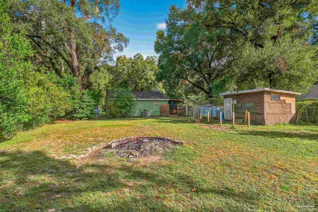 a view of a yard with a trees