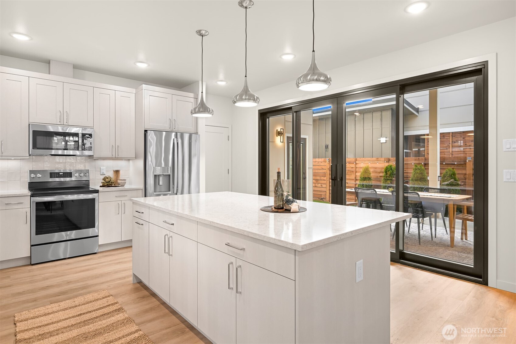 4268 Creston Way Bellingham, WA 98226 - Photo 16 of 40 a kitchen with a sink stove and refrigerator