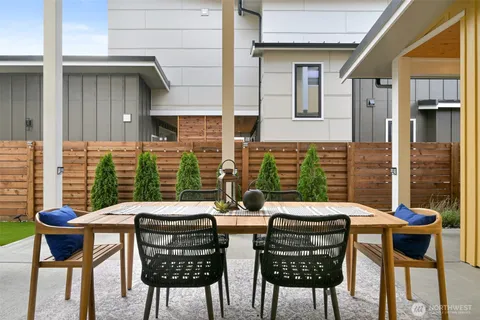a view of a table and chairs in the patio