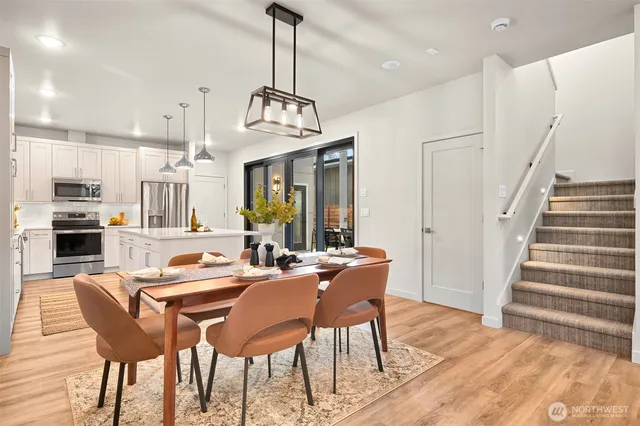 a view of a dining room with furniture