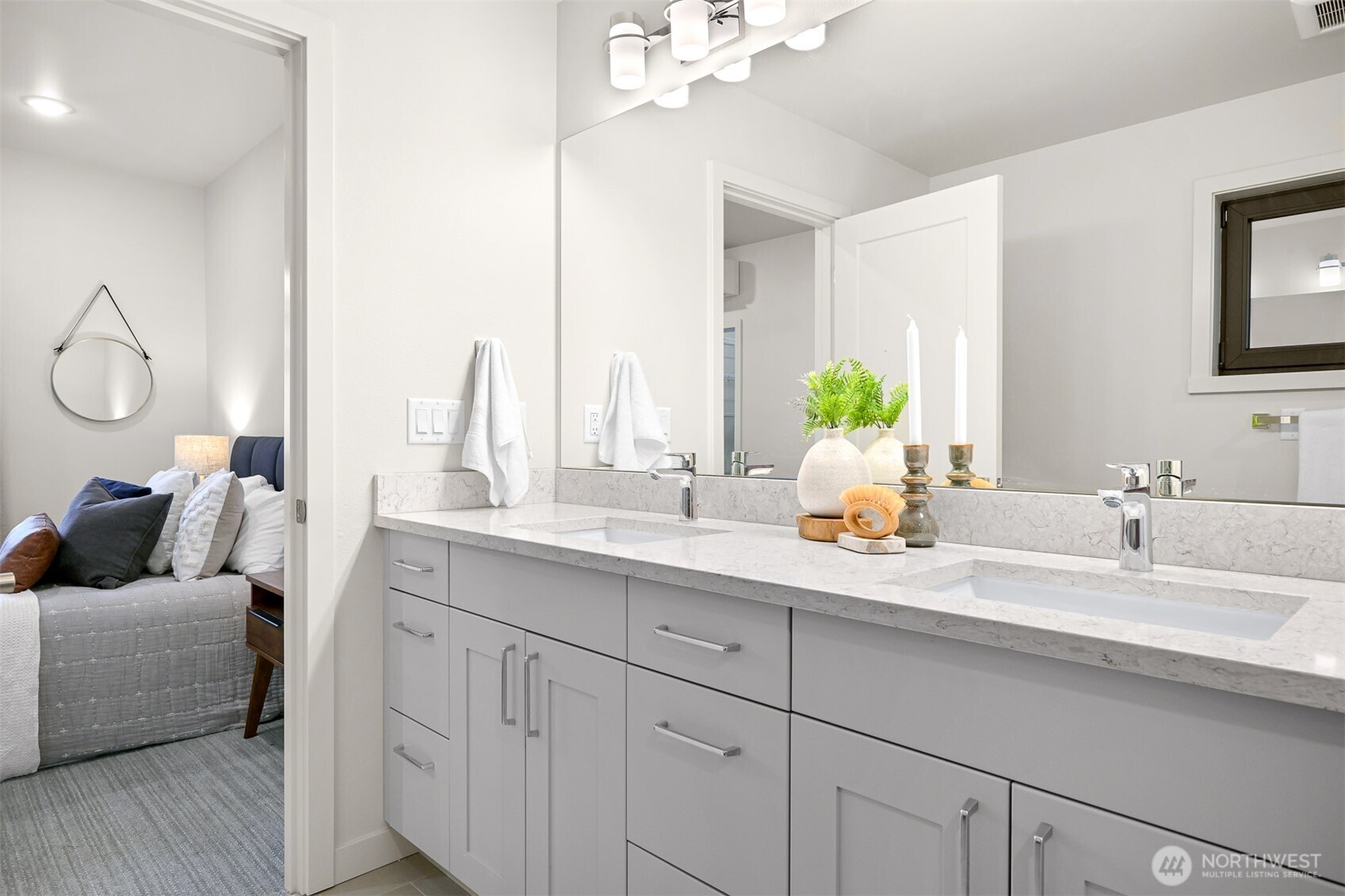 4268 Creston Way Bellingham, WA 98226 - Photo 25 of 40 a en suite bathroom with a double vanity sink and a mirror