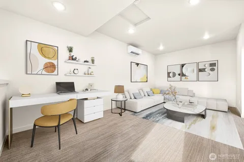 a living room with furniture and white walls