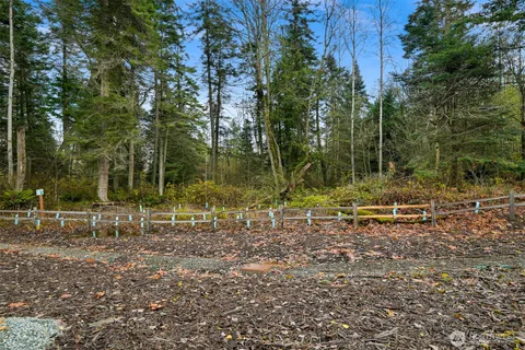a aerial view of a house with a yard
