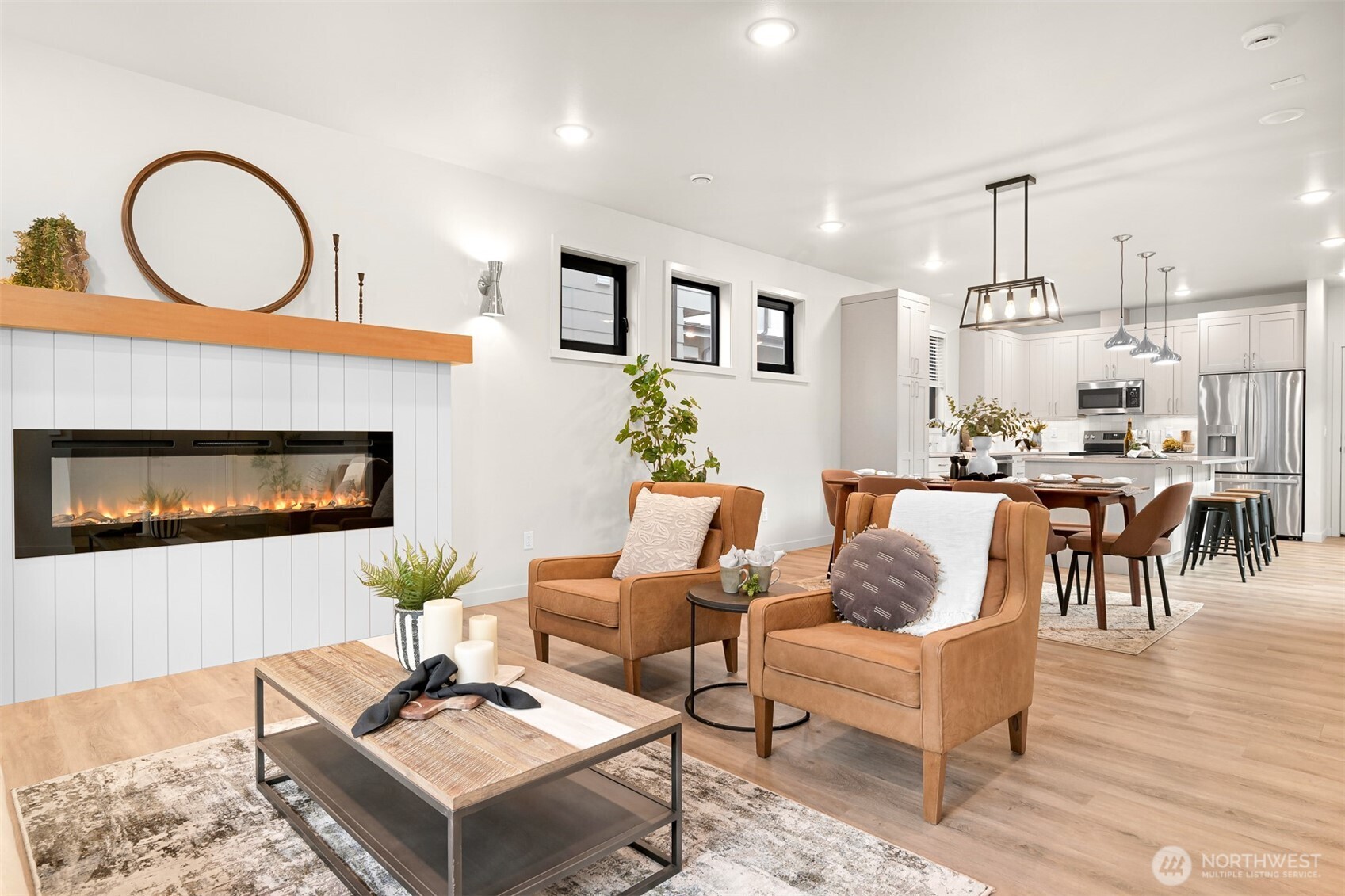 4268 Creston Way Bellingham, WA 98226 - Photo 6 of 40 a living room with furniture a dining table and kitchen view