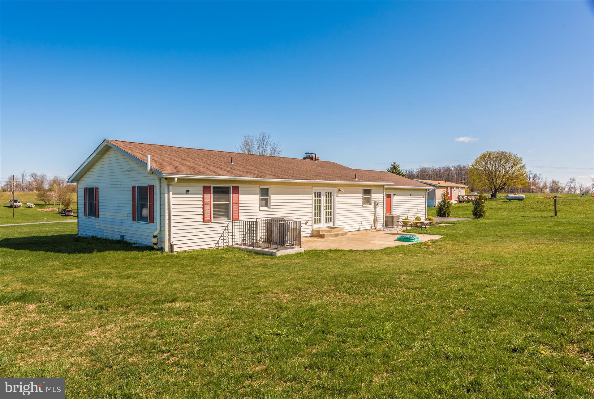 11411 Baker Road Keymar, MD 21757 - Photo 22 of 30 a view of a house with a yard