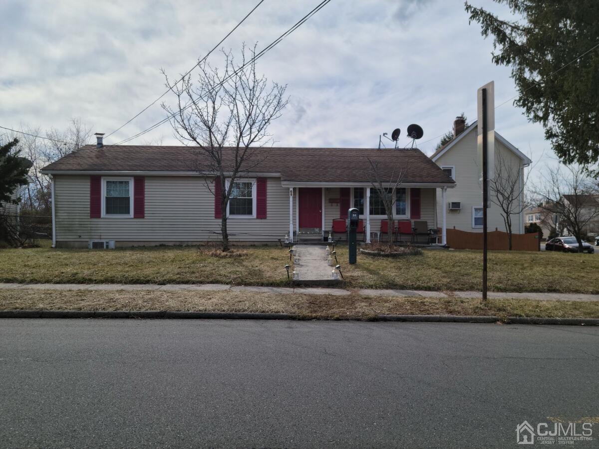 64 Stony Road West Edison, NJ 08817 - Photo 1 of 1 a front view of a house with a yard