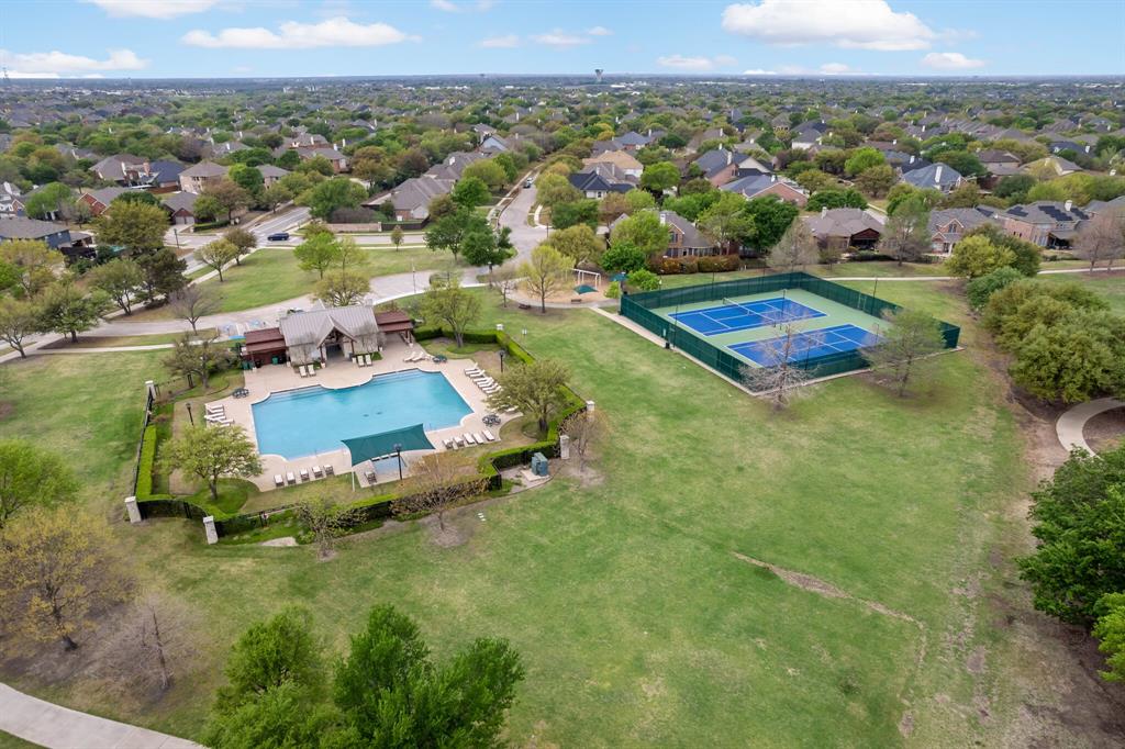 1670 Carson Lane Frisco, TX 75033 - Photo 35 of 40 Neighborhood pool, tennis courts and park area.