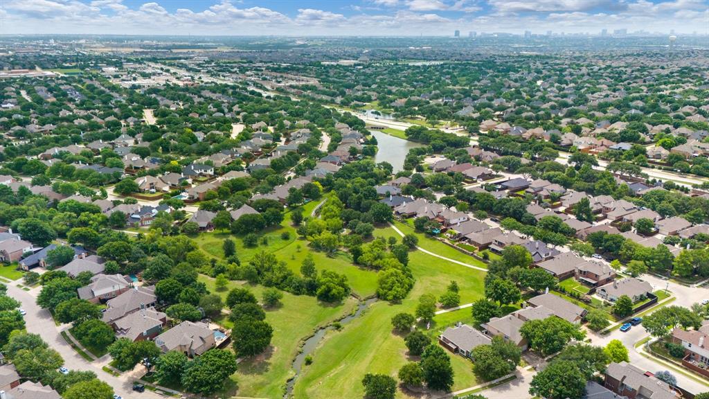 1670 Carson Lane Frisco, TX 75033 - Photo 38 of 40 Neighborhood greenbelt, creek and pond.