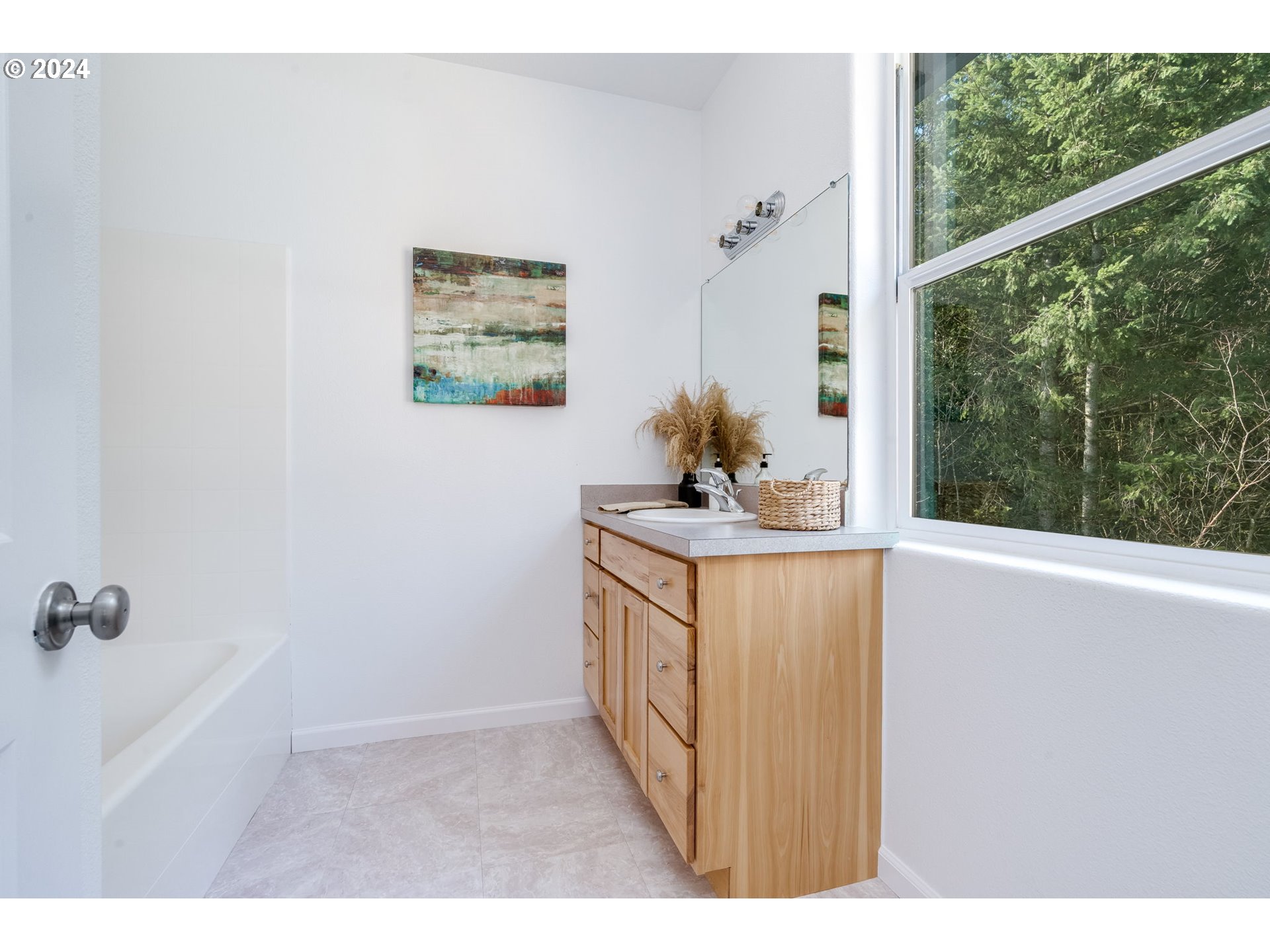 5605 Northeast Lessard Road Camas, WA 98607 - Photo 29 of 47 a bathroom with a sink and a mirror