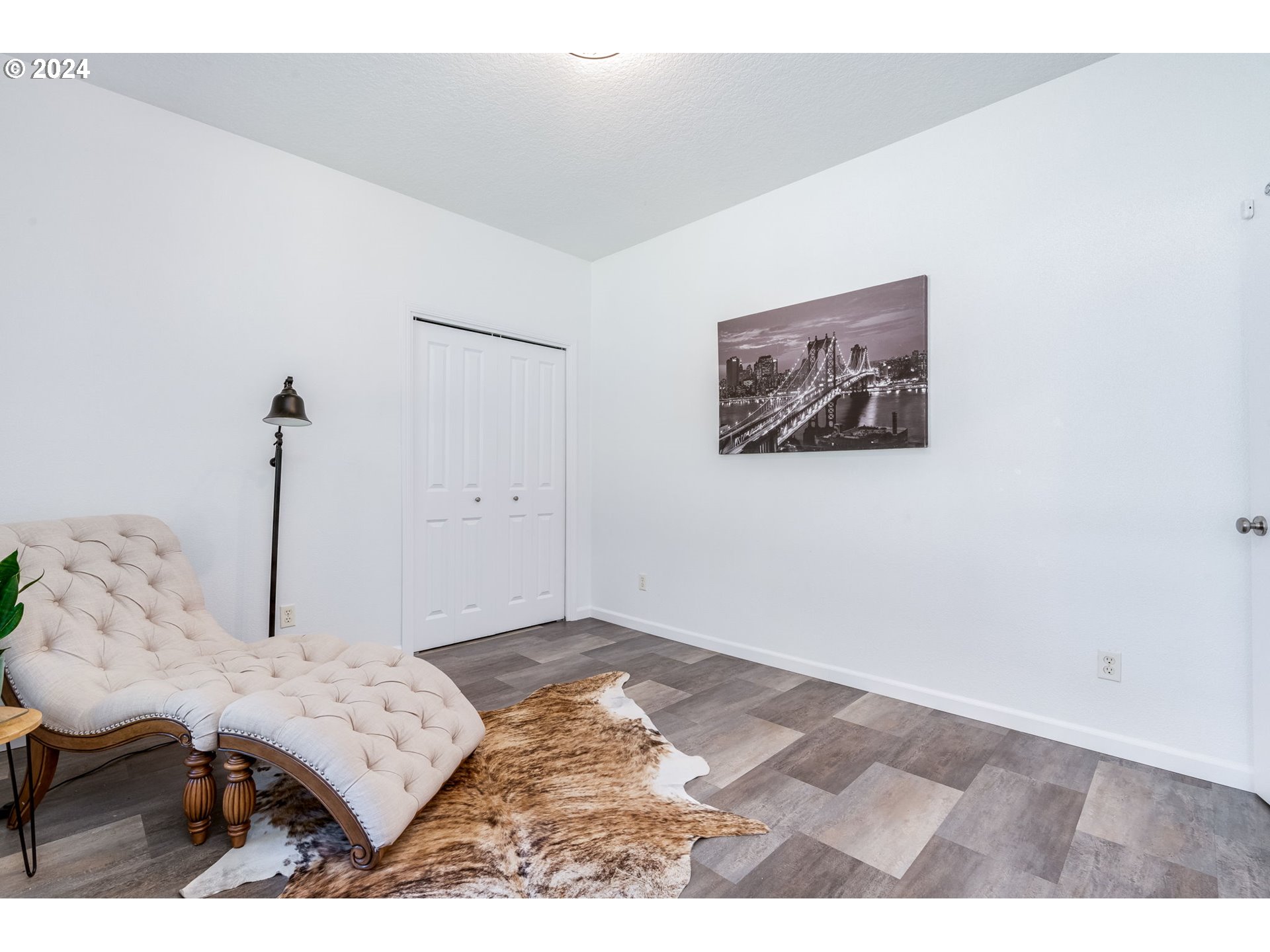 5605 Northeast Lessard Road Camas, WA 98607 - Photo 6 of 47 a view of a bedroom with a bed and a table