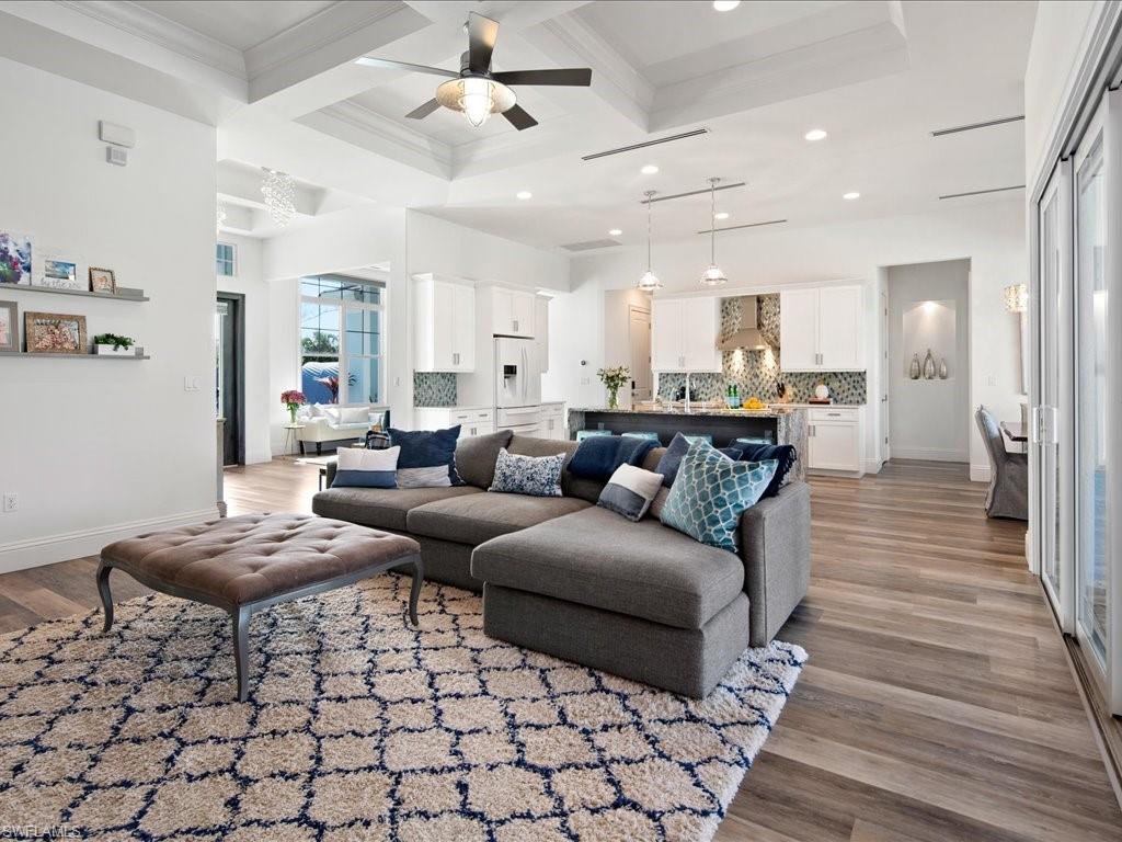 3275 68th Street Southwest Naples, FL 34105 - Photo 11 of 50 living room looking towards kitchen