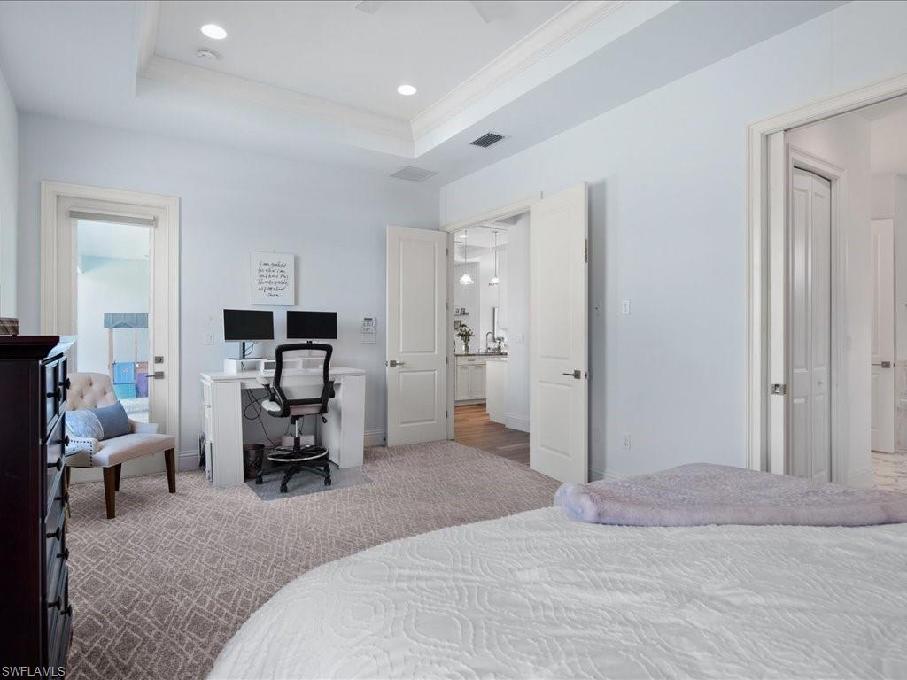 3275 68th Street Southwest Naples, FL 34105 - Photo 15 of 50 Master bedroom with door to lanai