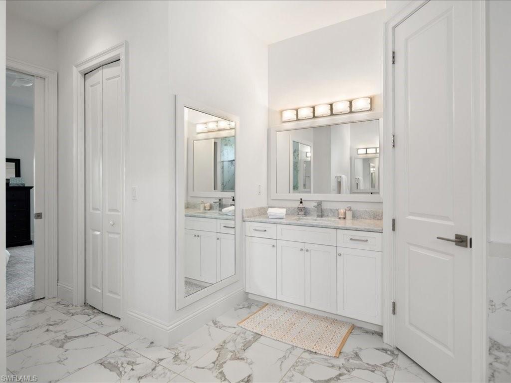 3275 68th Street Southwest Naples, FL 34105 - Photo 16 of 50 Master bathroom, dual sinks