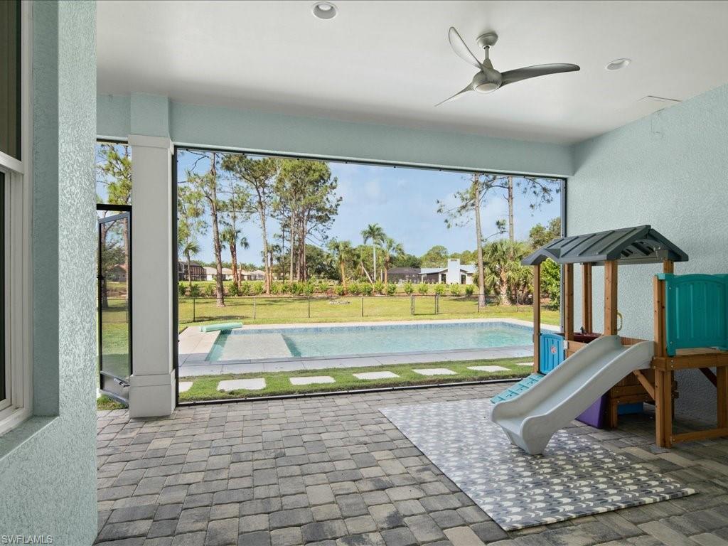 3275 68th Street Southwest Naples, FL 34105 - Photo 29 of 50 Screened enclosure