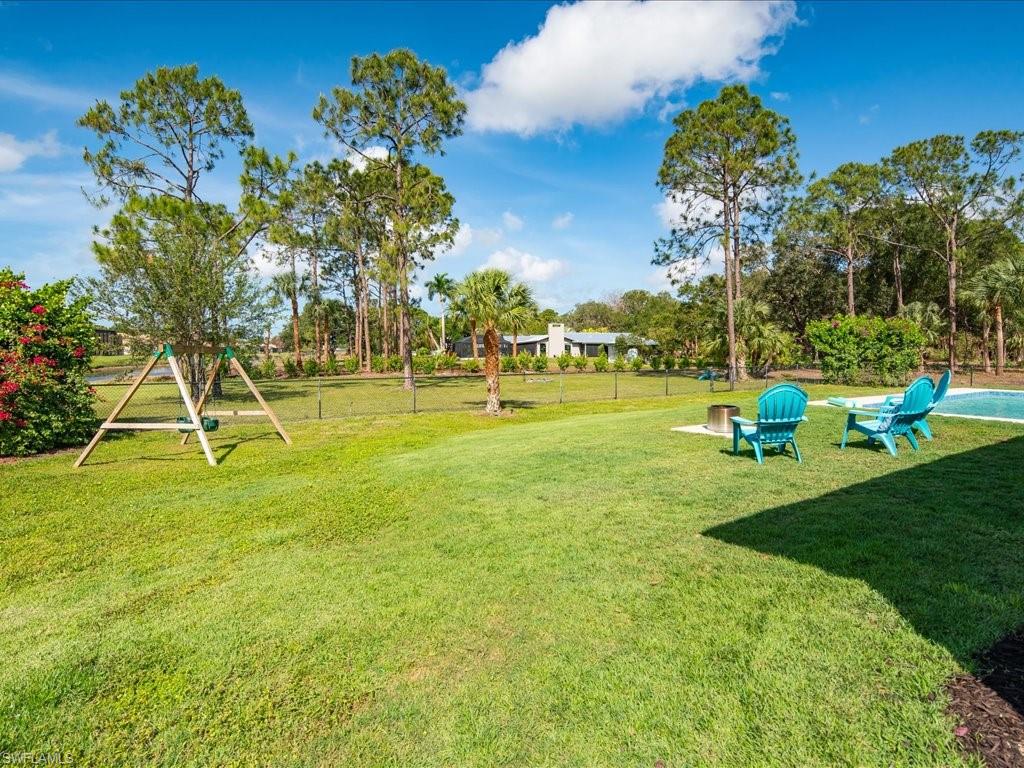 3275 68th Street Southwest Naples, FL 34105 - Photo 34 of 50 fenced in play area/backyard