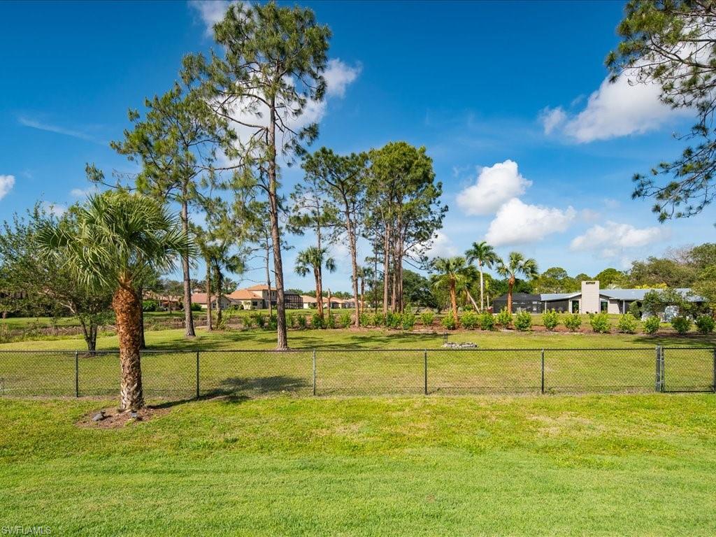 3275 68th Street Southwest Naples, FL 34105 - Photo 35 of 50 fully fenced backyard