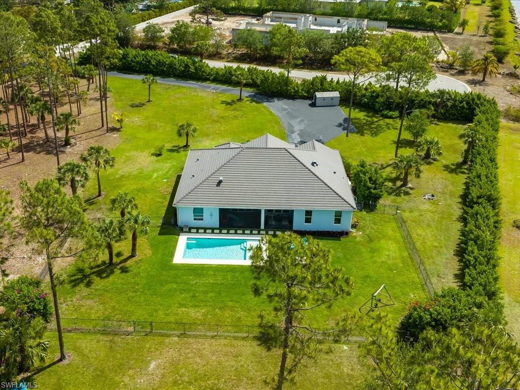 3275 68th Street Southwest Naples, FL 34105 - Photo 37 of 50 fenced in backyard