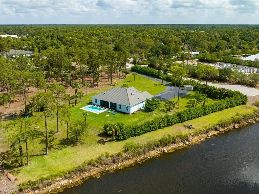 3275 68th Street Southwest Naples, FL 34105 - Photo 38 of 50 from the back of the structure towards cul-de-sac