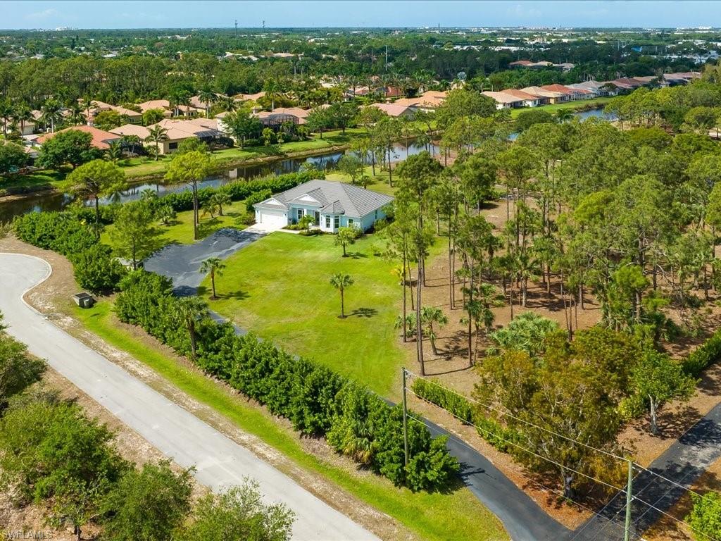 3275 68th Street Southwest Naples, FL 34105 - Photo 40 of 50 Long private driveway