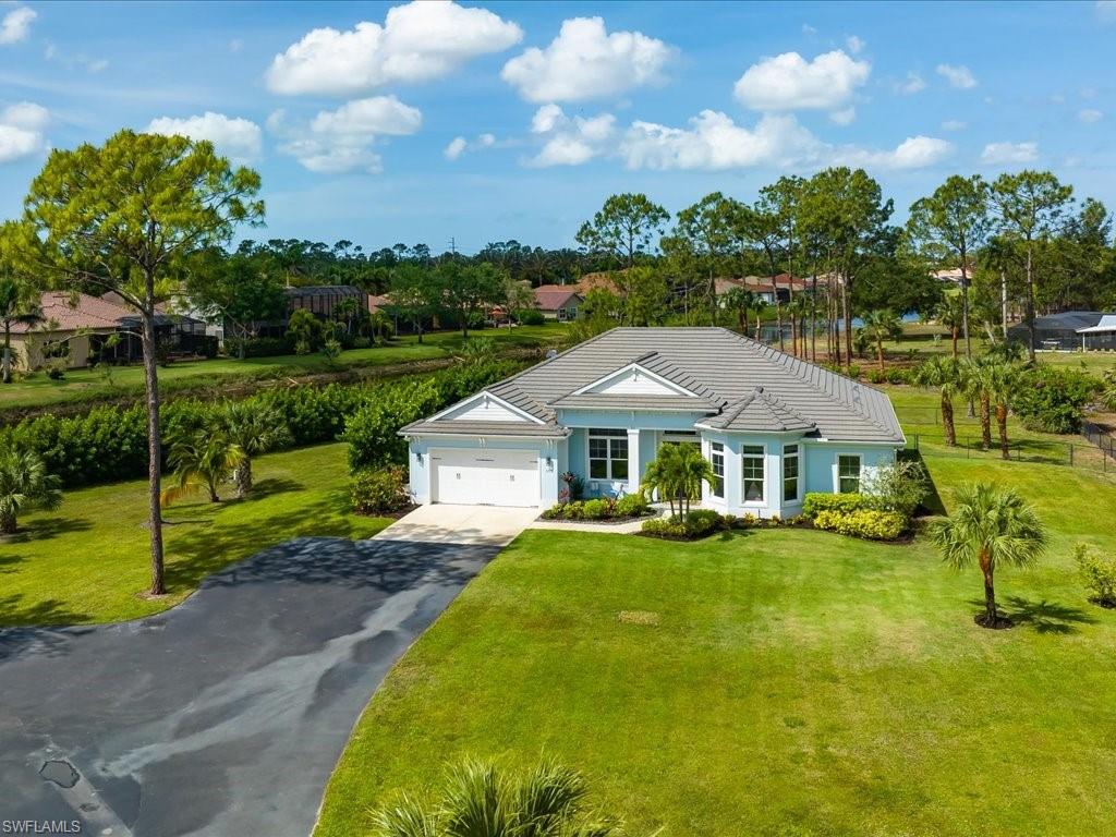 3275 68th Street Southwest Naples, FL 34105 - Photo 4 of 50 Daytime front elevation