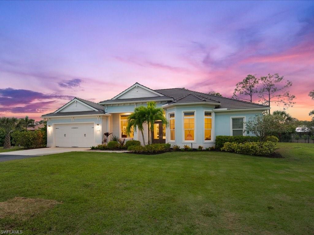 3275 68th Street Southwest Naples, FL 34105 - Photo 50 of 50 twilight side view